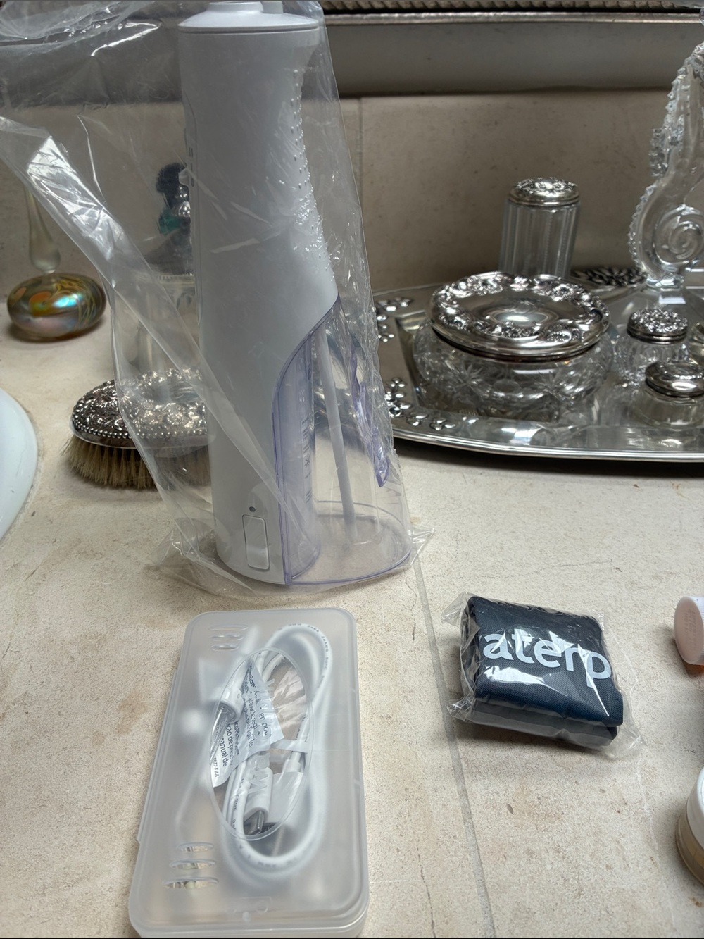 Travel size water pick. New in wrapping